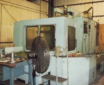 1986 KOMATSU VERTICAL TURNING AND MACHINING CNC Boring Mill-Vert Sgl Col. | Asset Exchange Corporation